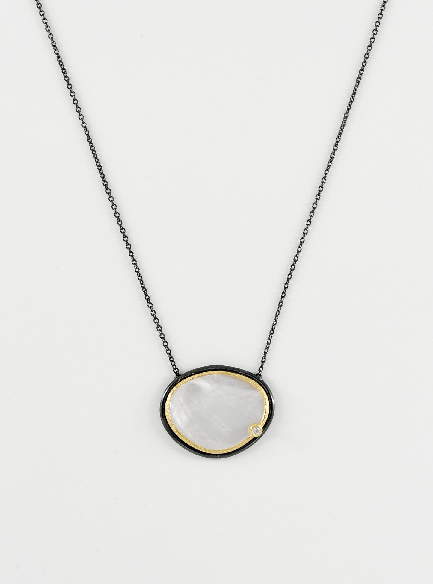 Egg Shape Mother of Pearl with CZ Necklace.