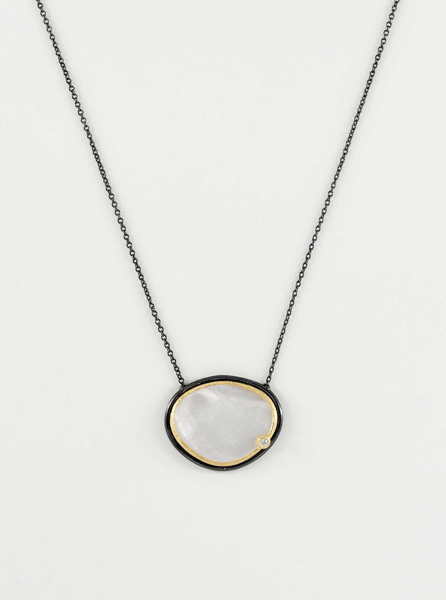 Egg Shape Mother of Pearl with CZ Necklace